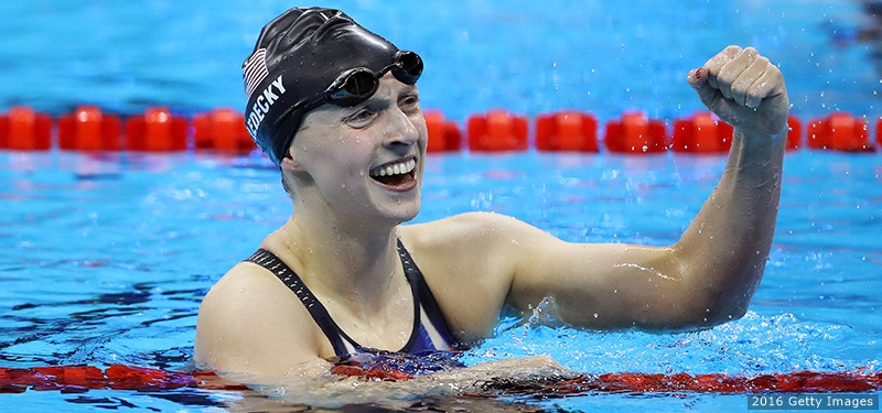 Katie Ledecky of the United States celebrates winning gold in the Women's 200m